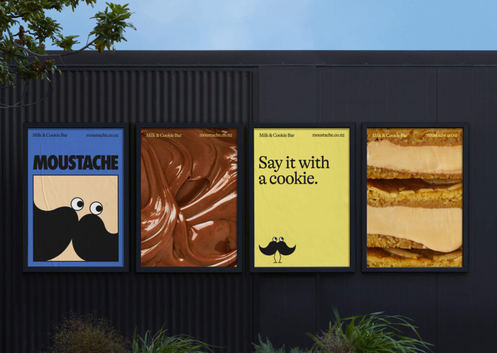 Image of Moustache's brand posters. 'Say it with a cookie' 